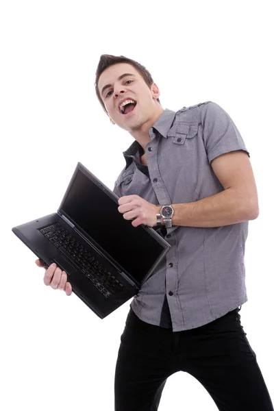 Jeune homme, présentant ordinateur portable — Photo