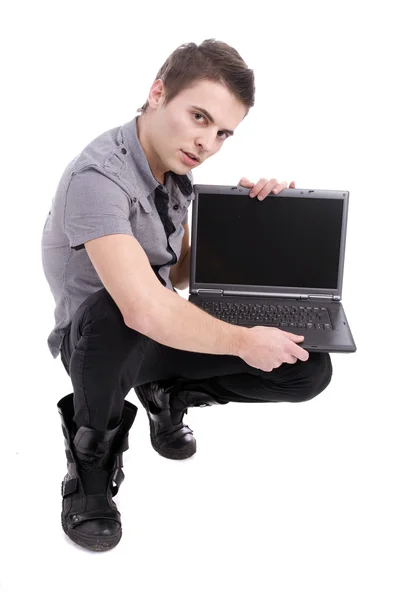 Fiatalember, bemutató laptop — Stock Fotó