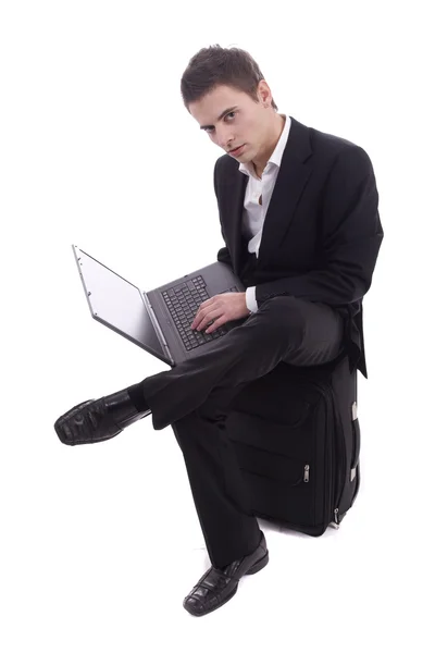 Деловой человек работает с ноутбуком — стоковое фото