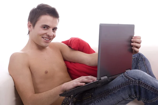 Young boy working with laptop — Stock Photo, Image