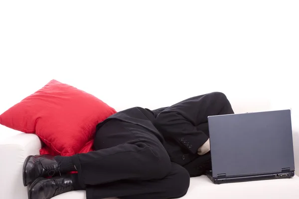 Homem de negócios dormindo no chouch — Fotografia de Stock