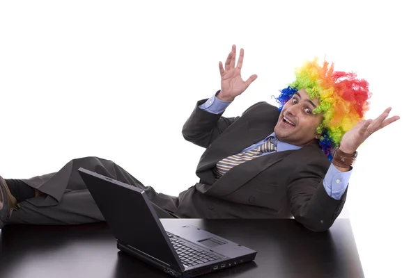 Affärsman med clown hår — Stockfoto