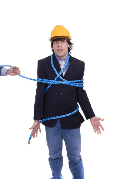 Businessman being pulled by a rope — Stock Photo, Image