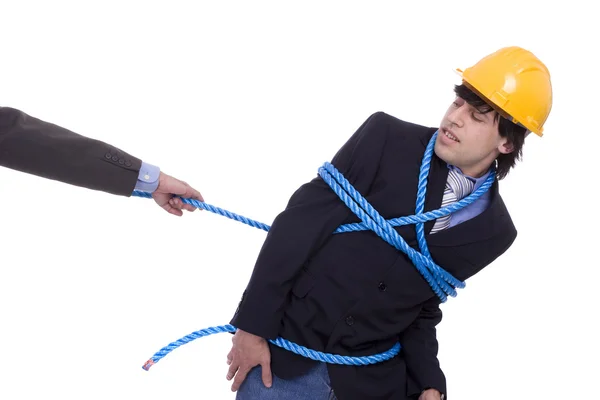Businessman being pulled by a rope — Stock Photo, Image