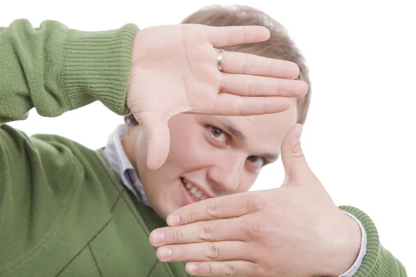 Jovem mostrando emolduramento gesto mão — Fotografia de Stock