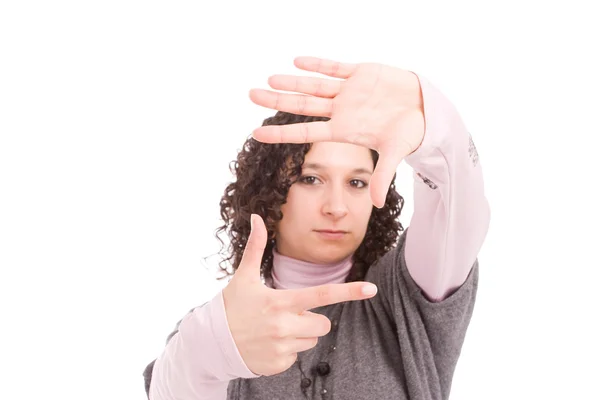 Giovane donna mostrando inquadratura gesto della mano — Foto Stock