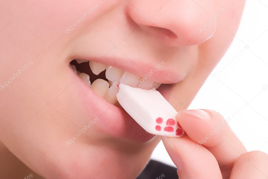 Close Shot of woman eating chewing gum
