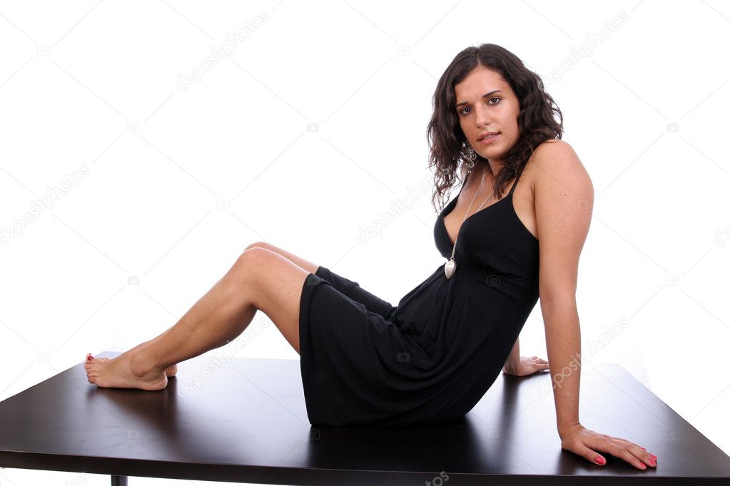 Very Attractive woman, posing on a desk