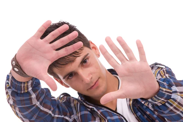 Genç adam çerçeveleme el hareketi gösterilen — Stok fotoğraf