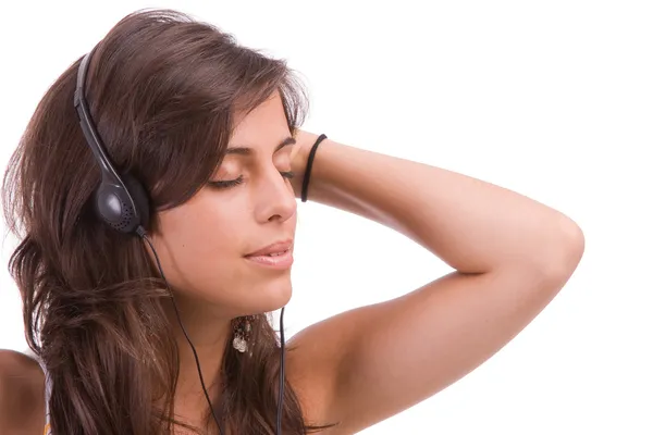 Fiatal lány zenét hallgat — Stock Fotó