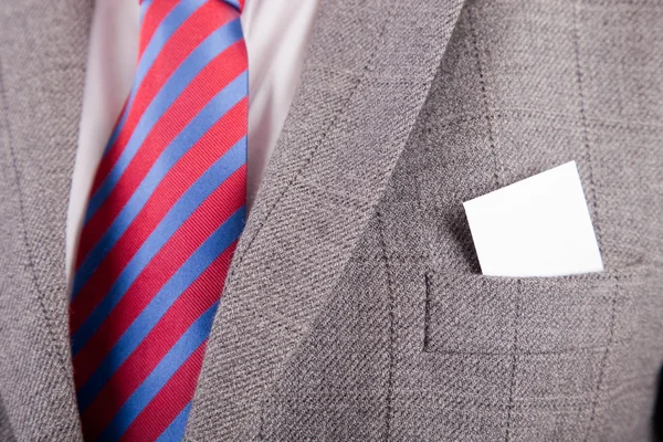Business card in suit's pocket — Stock Photo, Image