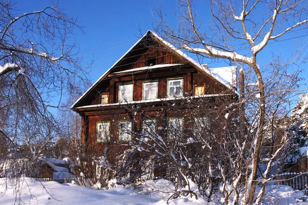 stock image Large cottage in the winter forest