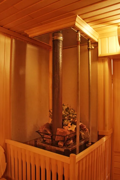 Pijp in de houten sauna — Stockfoto