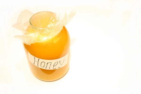 Бутылка с медом — стоковое фото
