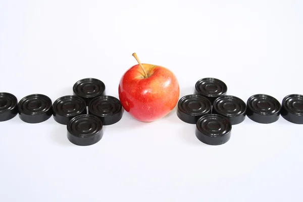 Two arrows to one apple — Stock Photo, Image