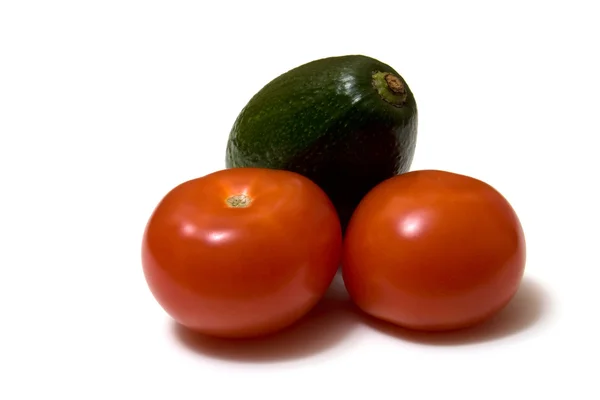 Tomato and avocado isolated on white — Stock Photo, Image
