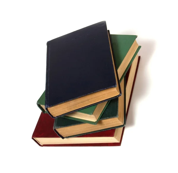 Bücherstapel isoliert auf weiß — Stockfoto