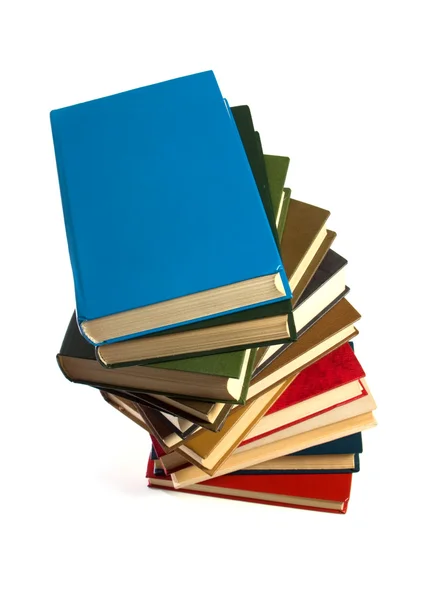 Стопка книг изолирована на белом — стоковое фото