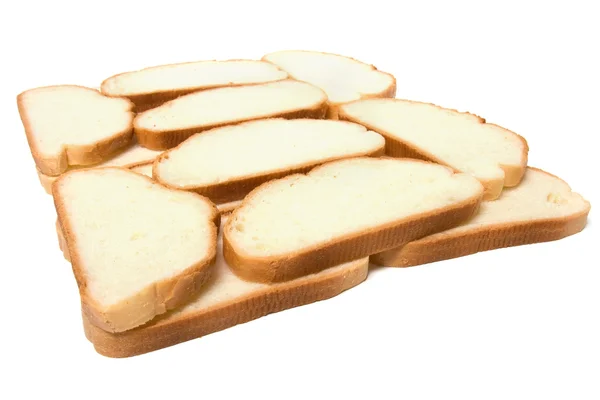 Baguete fatiada isolada em branco — Fotografia de Stock