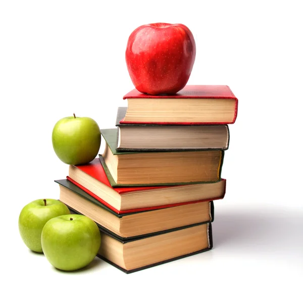 Apilado de libros con manzana — Foto de Stock