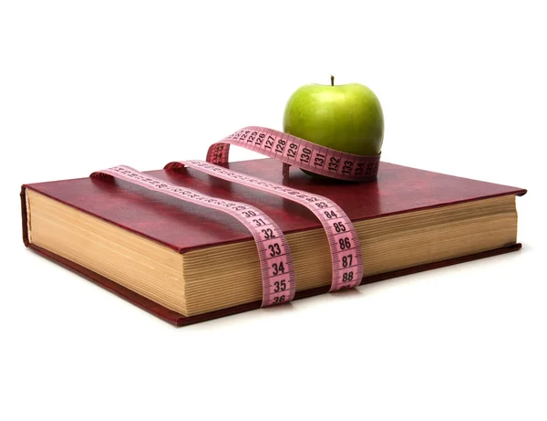 stock image Tape measure wrapped around book