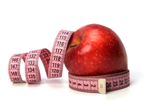 Centymetrem owinięty wokół jabłka — Zdjęcie stockowe