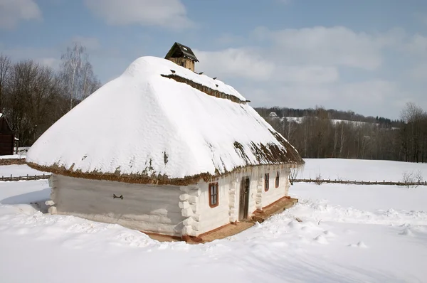 stock image Old rural hut under the snow