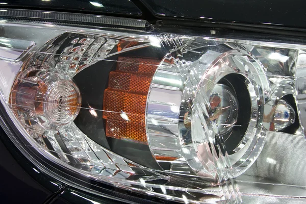 Close-up of a new modern car headlight — Stock Photo, Image