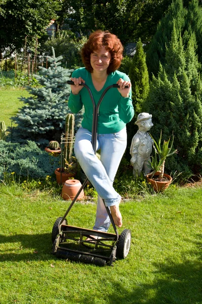 stock image Girl with lawn mower