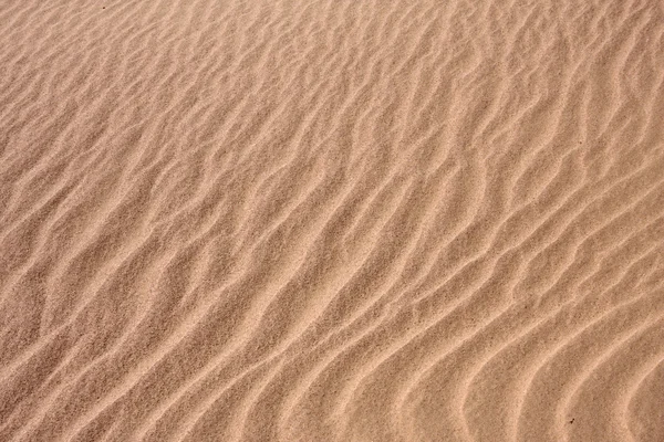 Golven op het zand in de woestijn — Stockfoto