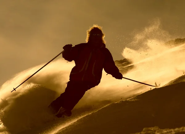Skiër in cloude van poeder — Stockfoto