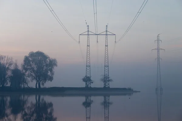Sunrise and transmission lines — Stock Photo, Image
