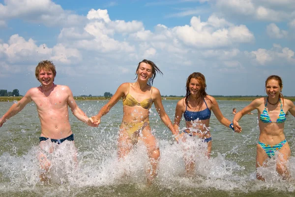 Stock image Youth running in water