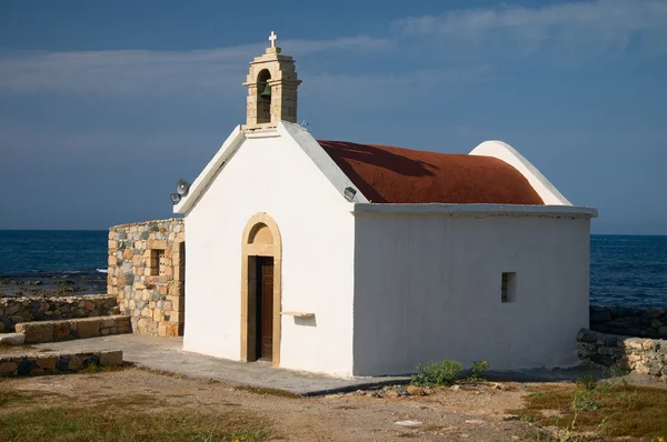 Old white church on sea coast — Stock Photo, Image