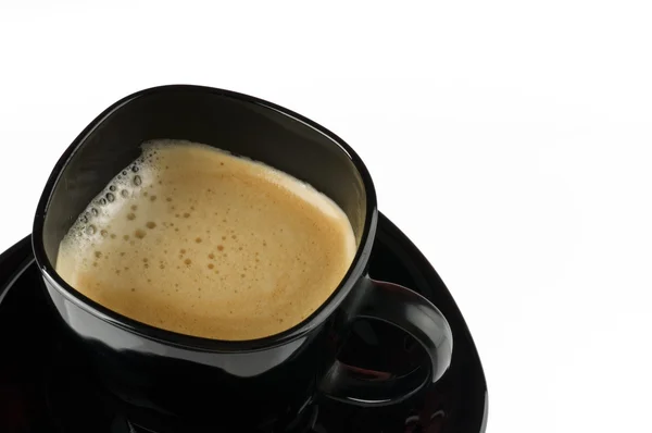 Tasse à café noire sur blanc . — Photo