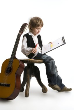 Little boy with his drawing on a white. clipart