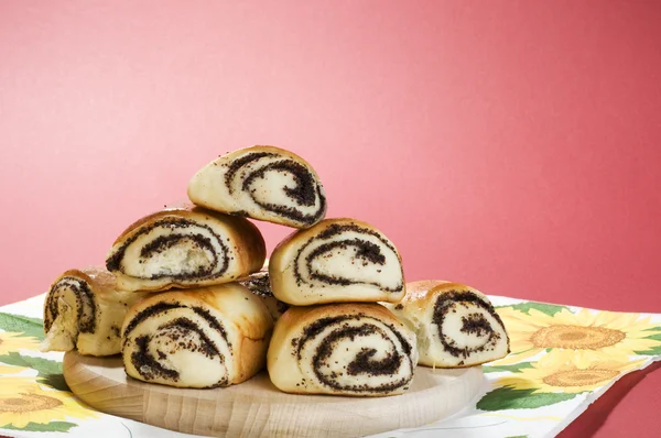 Stock image Baked bun with poppy seeds