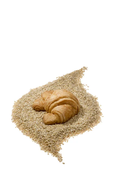 Croissant über Getreide — Stockfoto