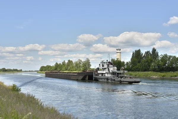 Stock image A towboat pushing a barge