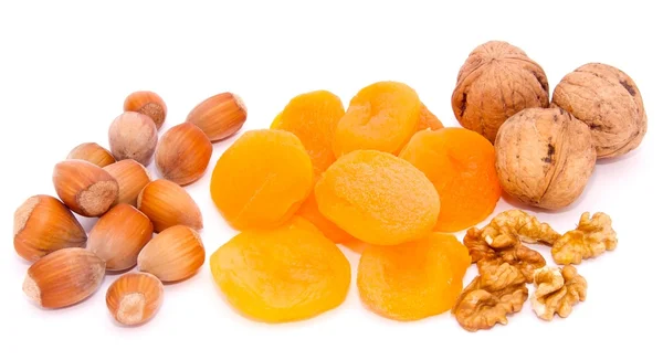 Dried apricots, hazelnut, open walnut — Stock Photo, Image