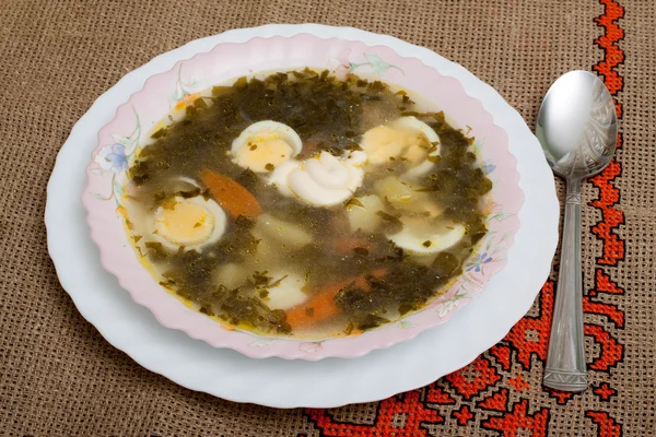 Sorrel soup seasoned with mayonnaise and — Stock Photo, Image