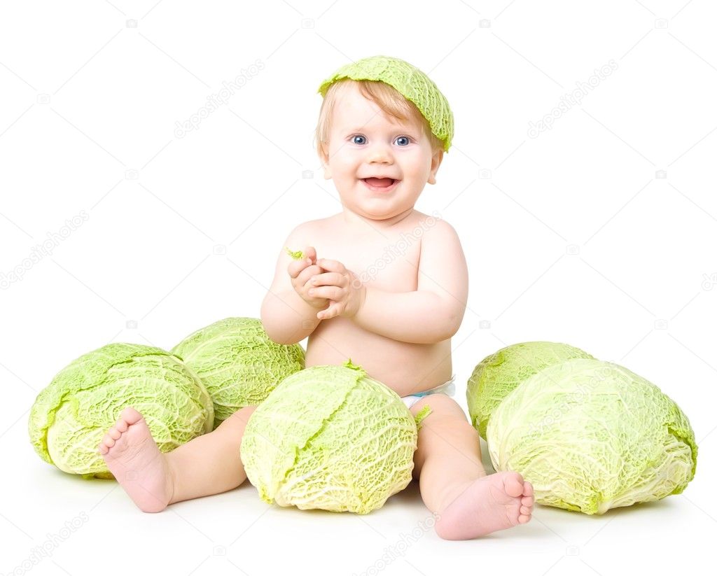 Small child and a savoy cabbage