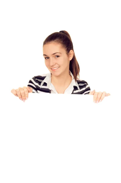 Lachende meisje houdt van een leeg wit bord — Stockfoto