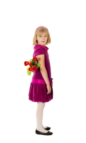 Hezká dívka s kyticí tulipánů — Stock fotografie
