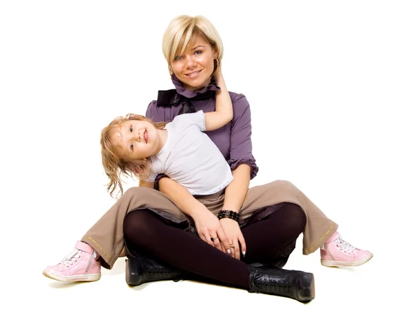 Niña abrazando a una madre —  Fotos de Stock