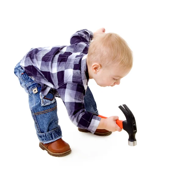 Ребенок с молотком — стоковое фото