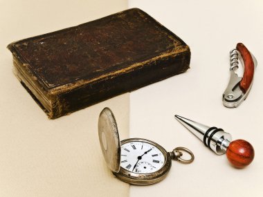 Old book and pocket watch clipart
