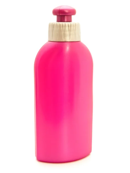 Красная пластиковая бутылка — стоковое фото