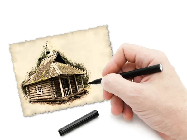 Ручка в руке рисует старую часовню — стоковое фото