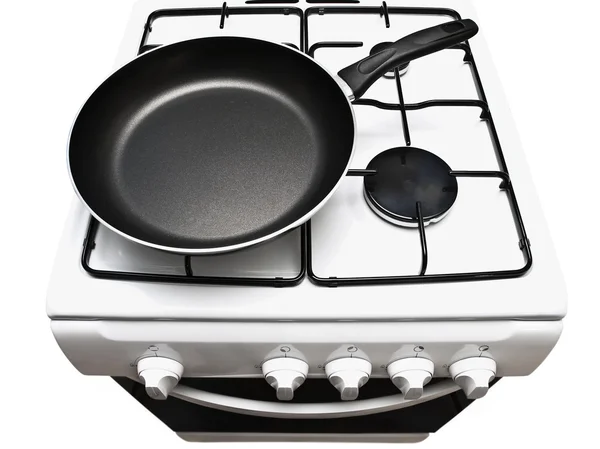 Сковородка у газовой плиты — стоковое фото